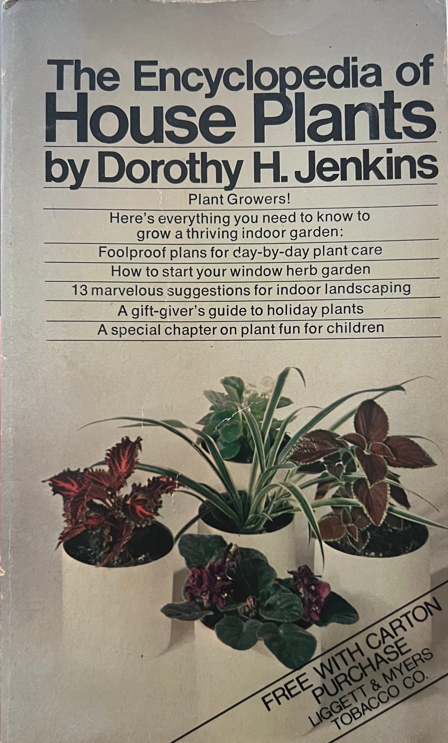 Book cover of 'The Encyclopedia of House Plants' by Dorothy H. Jenkins with images of potted plants.