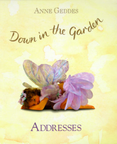 Book cover of 'Down in the Garden' by Anne Geddes featuring a child in fairy wings on a yellow background.