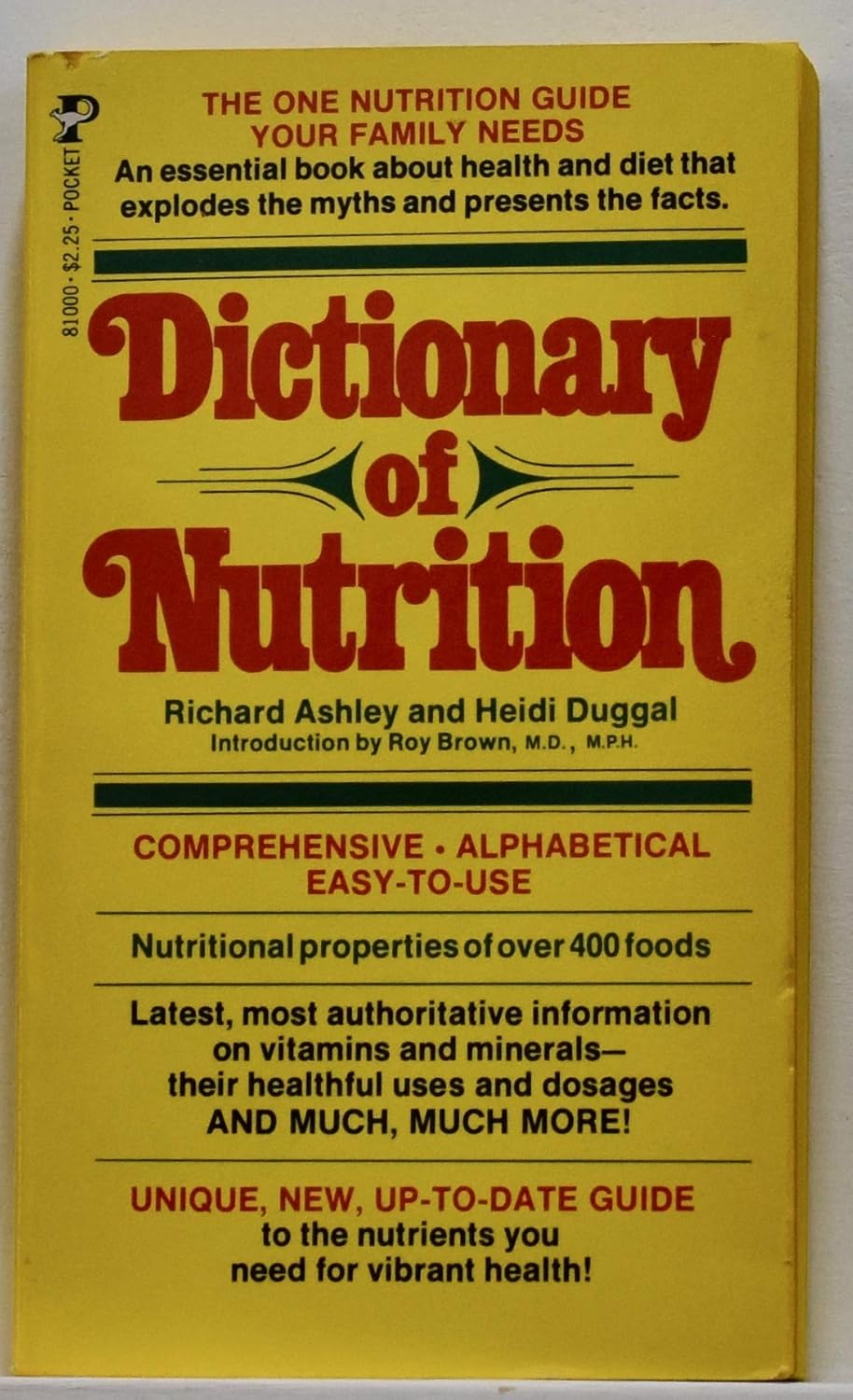 Book cover of 'Dictionary of Nutrition' with yellow background and red text.
