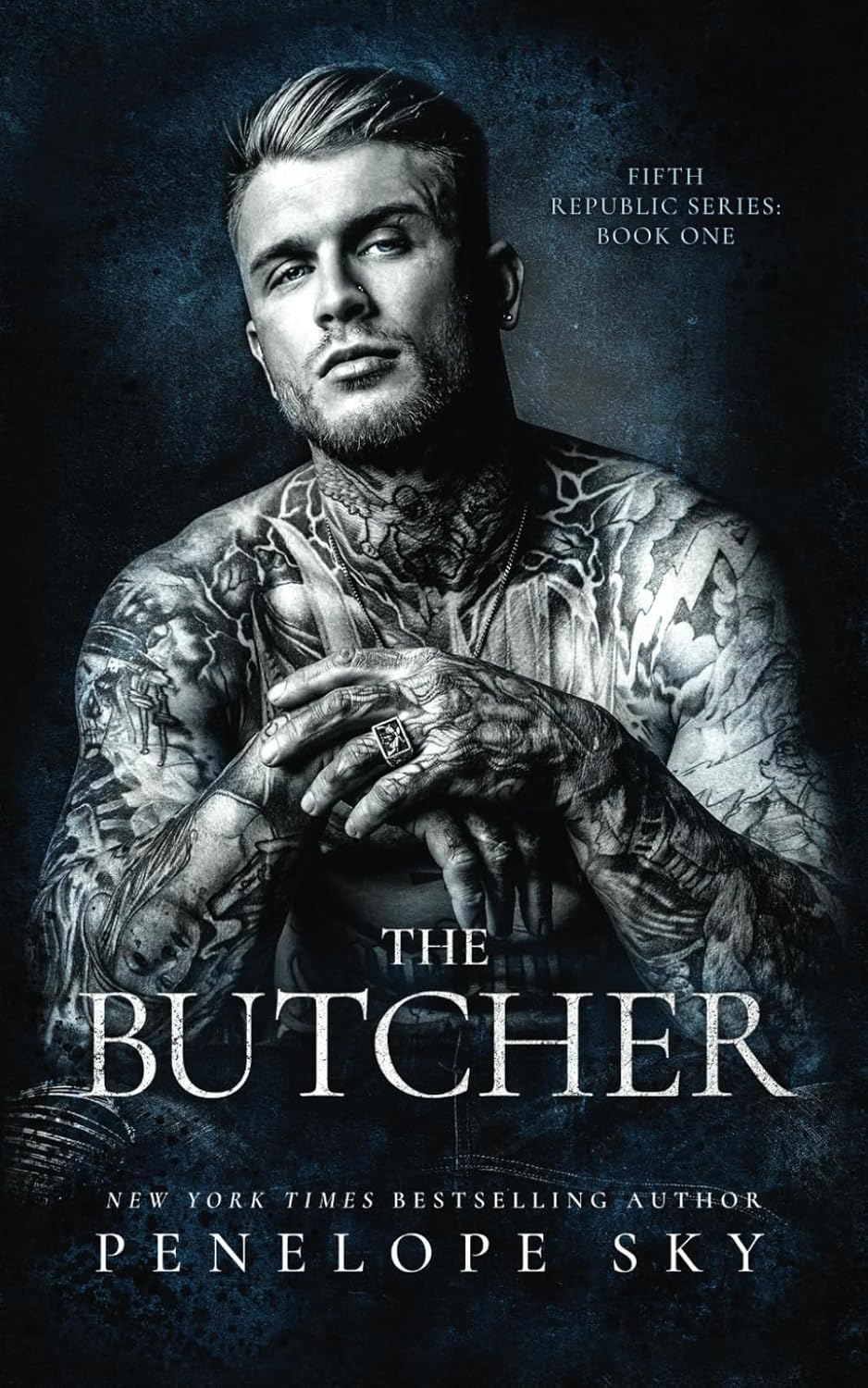 Book cover of 'The Butcher' featuring a tattooed man with text about the Republic Series.