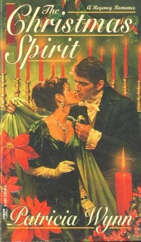 Book cover of 'The Christmas Spirit' by Patricia Wynn featuring a couple embracing with candles and poinsettias.